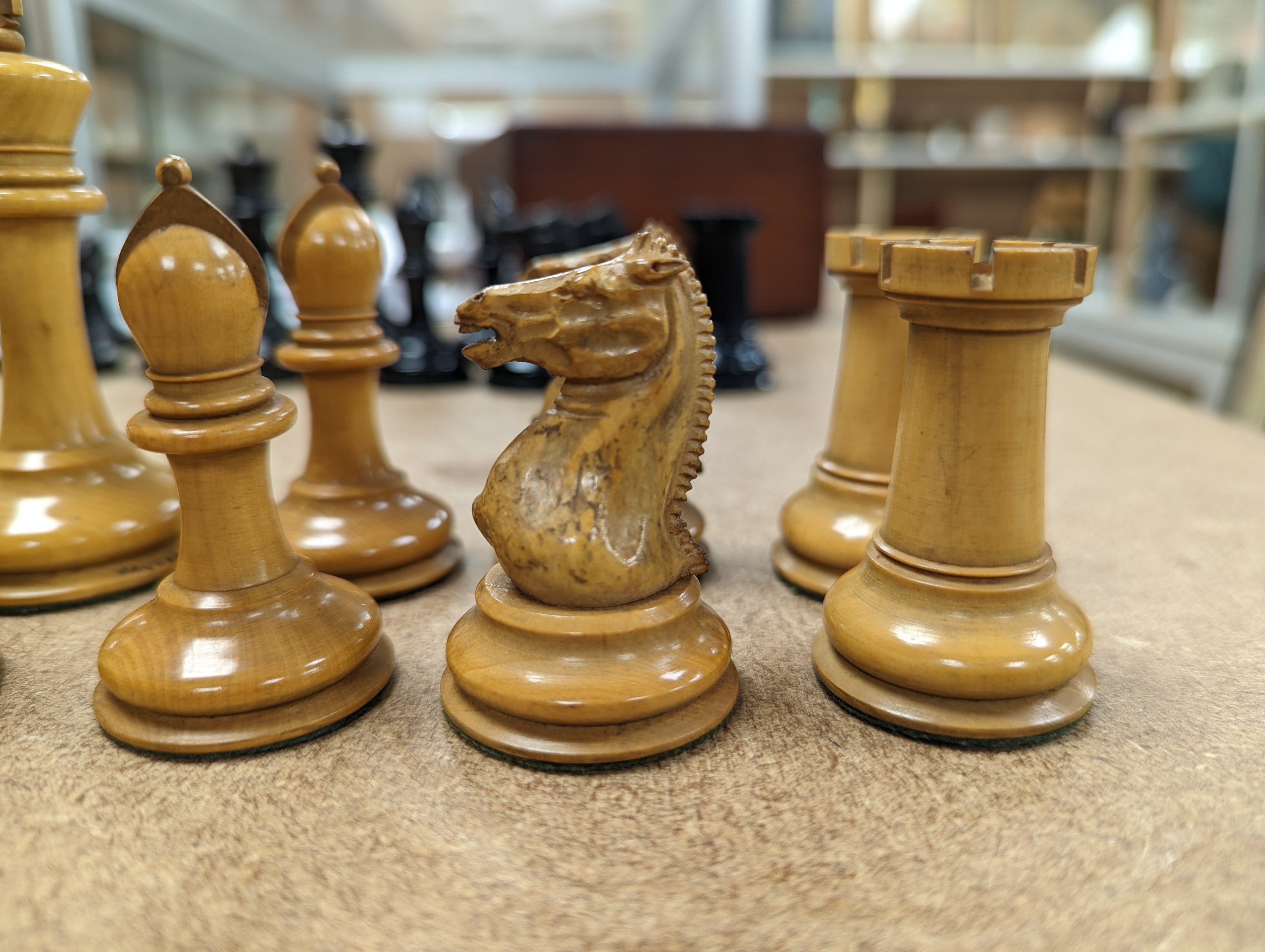 A boxed Jaques Staunton boxwood and ebony chess set, White king stamped Jaques London, 8.5cm high